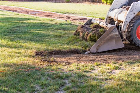 how to level yard with skid steer|How To Grade With A Skid Steer .